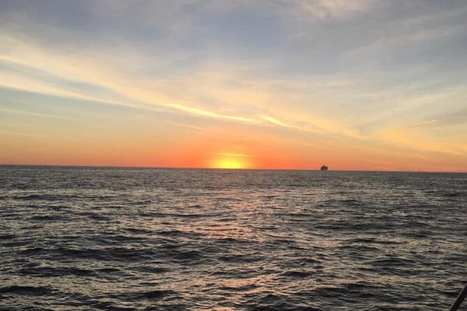 2 Hour Sunset Tour on Catamaran in Cabo San Lucas - Pacific side sights: rock formations, Divorce Beach, and seasonal whale time