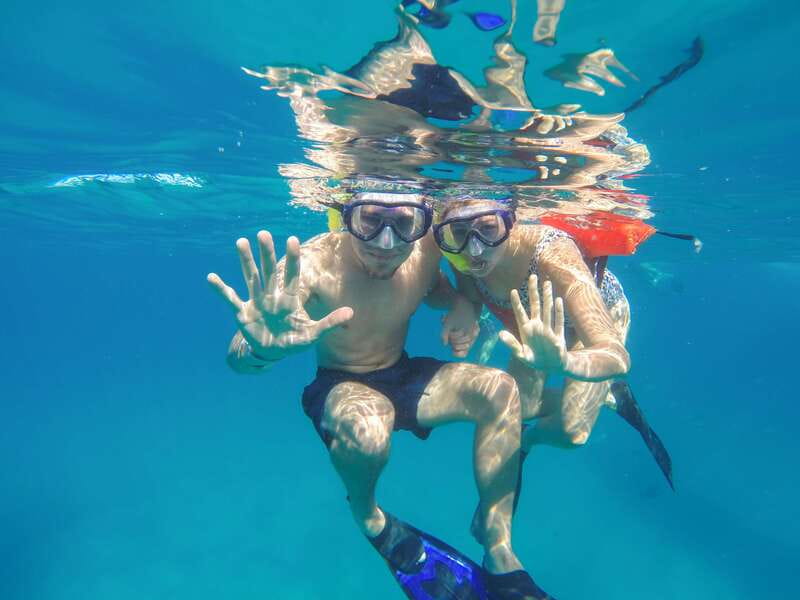 Cabo Catamaran Snorkel: Arch & Santa Maria, Open Bar, Snacks - Sailing Past Lovers Beach and the Arch of Cabo San Lucas