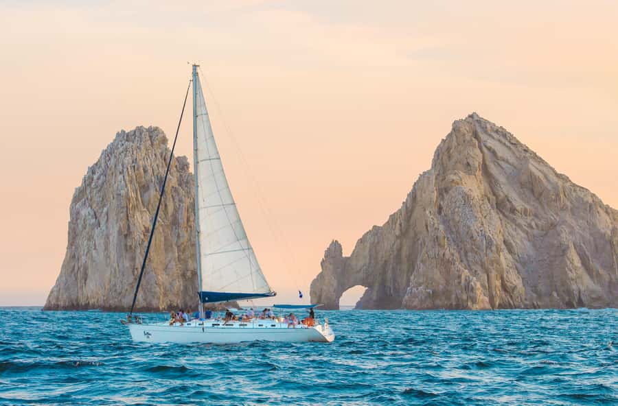 Cabo Luxury Sunset Sailing Adventure with Open Bar - On deck: open bar, appetizers, and the rhythm of the night