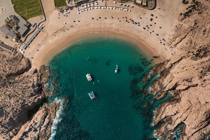 Cabo San Lucas and Santa Maria Bay Snorkeling Sightseeing Cruise - Cabo Blue Boat vibe: open bar, lunch, and the music level
