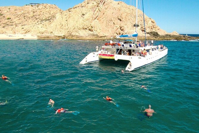 Cabo San Lucas Catamaran Cruise: Snorkel or Sunset Adventure - Open bar + DJ music: the on-board party factor