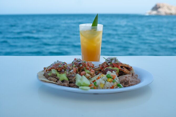Cabo San Lucas Sunset Cruise Full dinner, open bar and transfer - A Secluded Cove Moment You Can Only Reach by Boat
