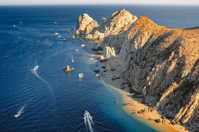 Cabo San Lucas Sunset Cruise with Open Bar and Snacks - Getting the sights: El Arco, pelican rock, Lovers’ Beach, and sea lions