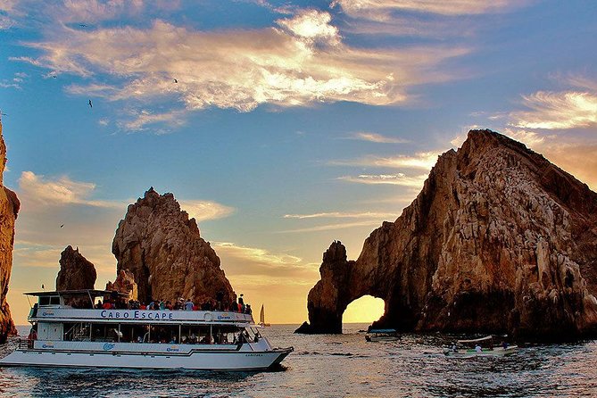 Cabo San Lucas Sunset Dinner Cruise with Open Bar - Extras that can change the bill: upgrades, dock fees, tips, and photos