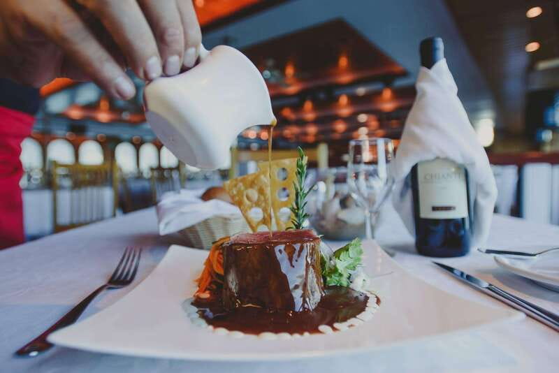 Cabo San Lucas: Sunset Premier Dinner & Show Cruise - Drinks and Live Music: The Open Bar Part of the Experience