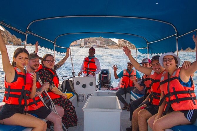 Glass-bottom boat tour to the Arch + beach time - The glass-bottom reality: plexiglass window, not a see-through boat
