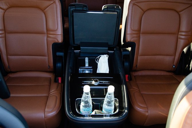 Lincoln Navigator Roundtrip Private Luxury Transportation - Bottled Water, WiFi, and Chargers: Small Inclusions That Save Your Day