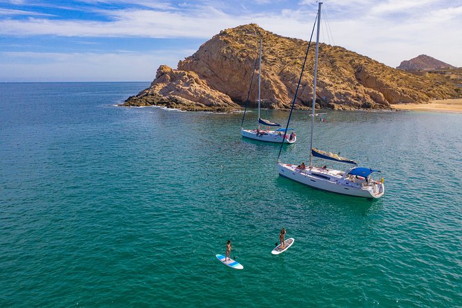 Los Cabos Luxury Sailing, Snorkel and Lunch Cruise - Onboard Fun Beyond Snorkeling: Paddleboards and Boat-Steering