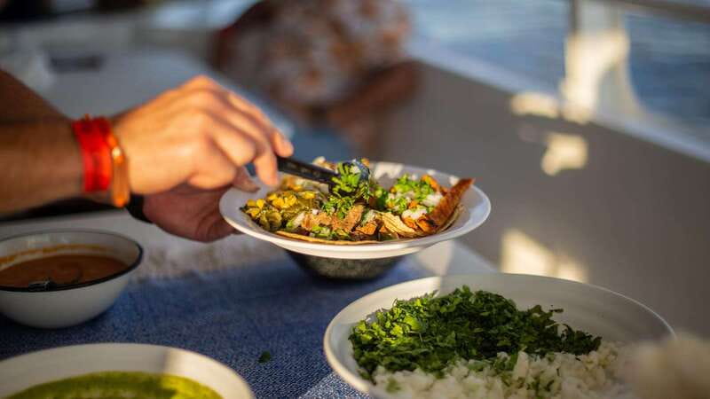 Los Cabos: Sunset Dinner Cruise with Transportation - The onboard experience: clean boat, roam space, and a dance-friendly mood