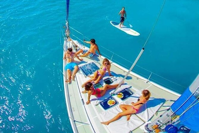 Luxury Sailboat Tour at Sunset in Los Cabos + Snacks + Premium Drinks - Deck comfort after sunset: towels and staying warm