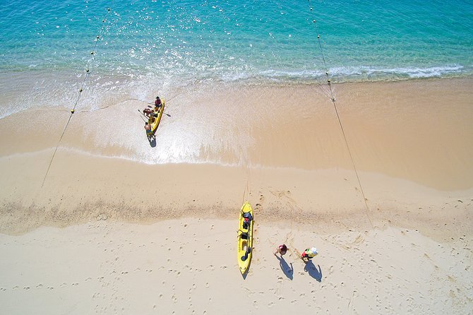 Private Glass bottom Kayak and snorkel at two Bays - The big idea: a private two-bay day built for real marine time