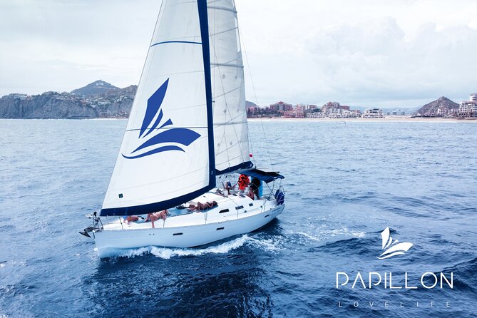 Private Sailboat tour in Cabo San Lucas with Papillon Yachts - Stop 2: Medano Beach for Chill Time, Snacks, and Open Bar (About 30 Minutes)
