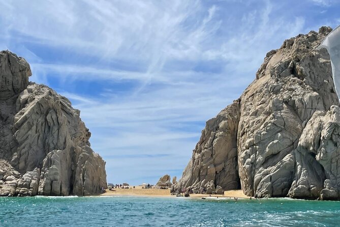 Shared Experience Glass Bottom Boat to the Arch in Cabo San Lucas - Pelican Beach, sea lions, and the rock-formation photo route