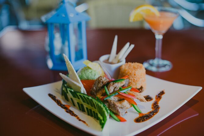Sunset Mexican Dinner Cruise and Live Music in Cabo San Lucas - Weather, deck comfort, and the seating setup you might notice