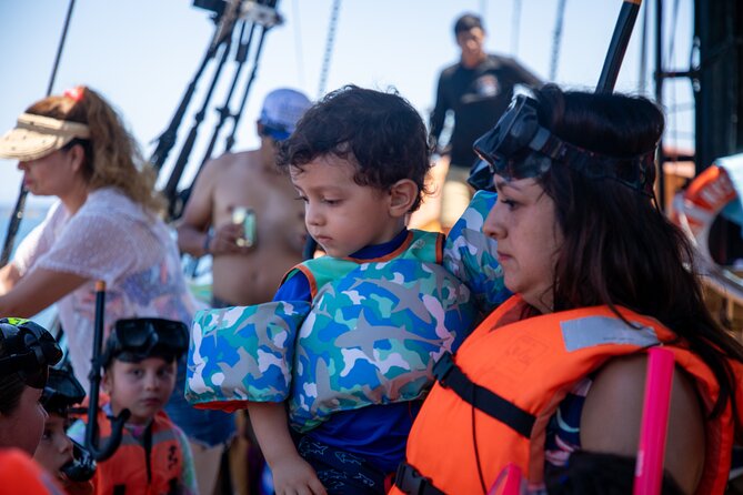 Treasure Hunt Snorkeling Lunch Cruise from Cabo San Lucas - Onboard Entertainment: Games, Music, and Family-Friendly Energy